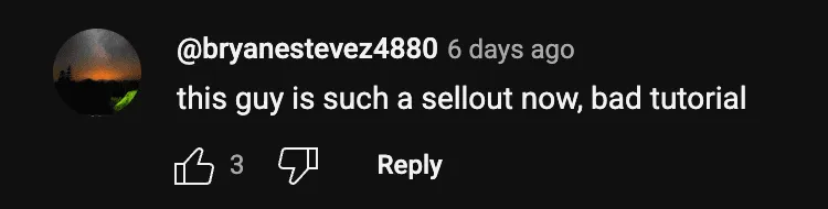 Comentário no YouTube acusando um vídeo promocional do BuildYourStore.ai de ser publicidade paga